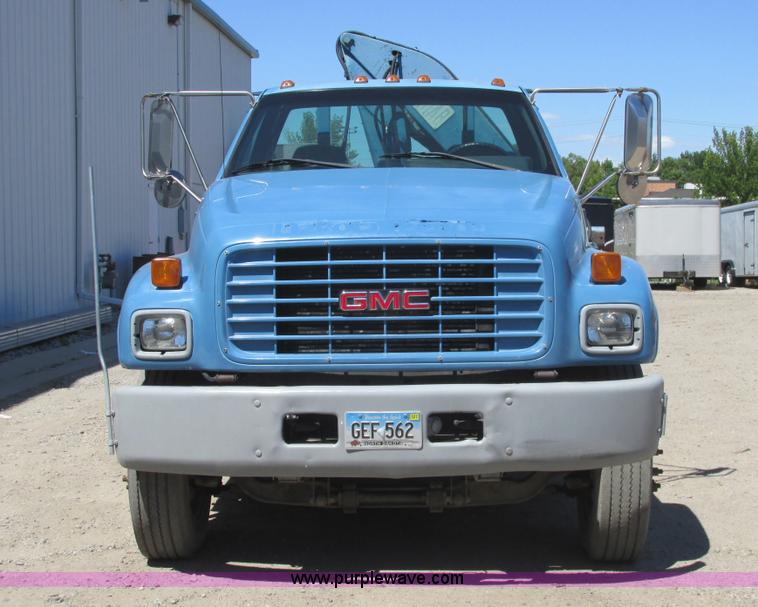 image for item A8848 1999 GMC C7500 flatbed truck with crane