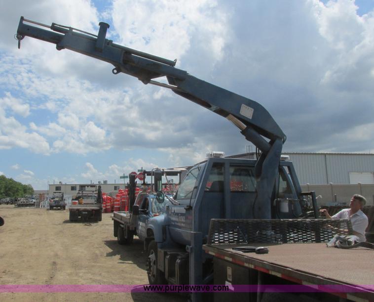 image for item A8848 1999 GMC C7500 flatbed truck with crane