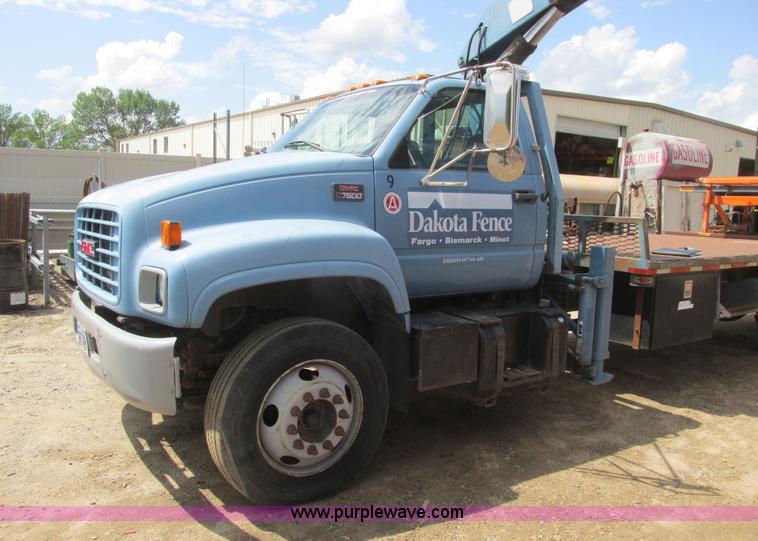 image for item A8848 1999 GMC C7500 flatbed truck with crane