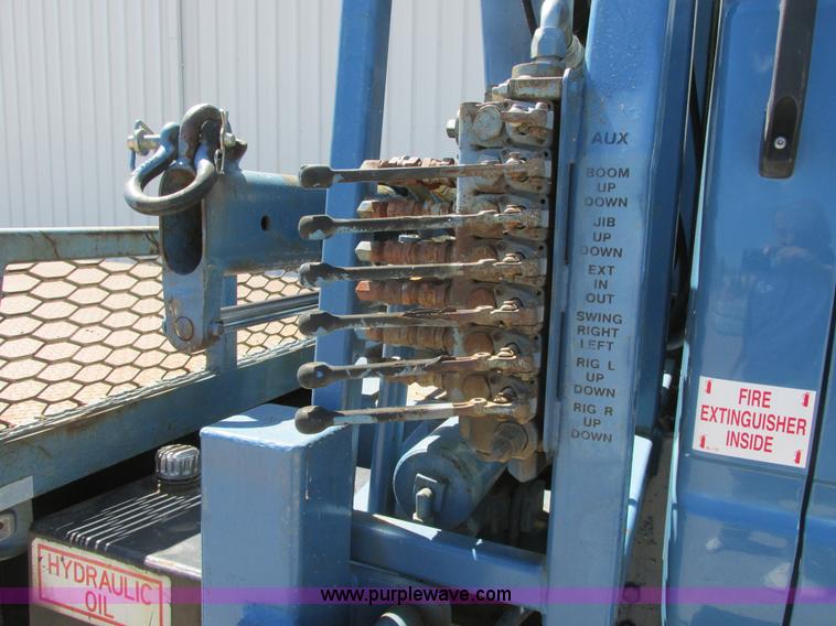 image for item A8848 1999 GMC C7500 flatbed truck with crane