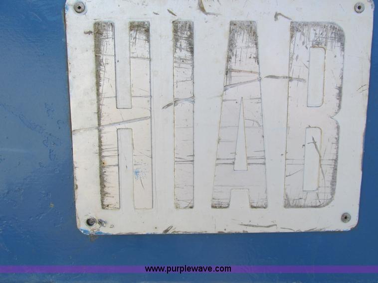 image for item A8848 1999 GMC C7500 flatbed truck with crane