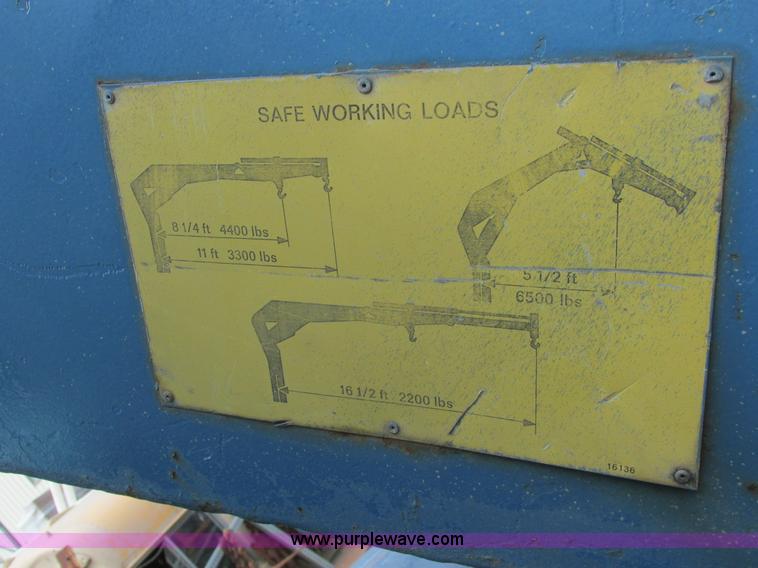 image for item A8848 1999 GMC C7500 flatbed truck with crane