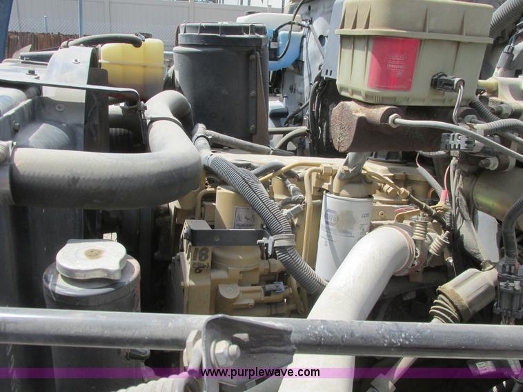 image for item A8848 1999 GMC C7500 flatbed truck with crane