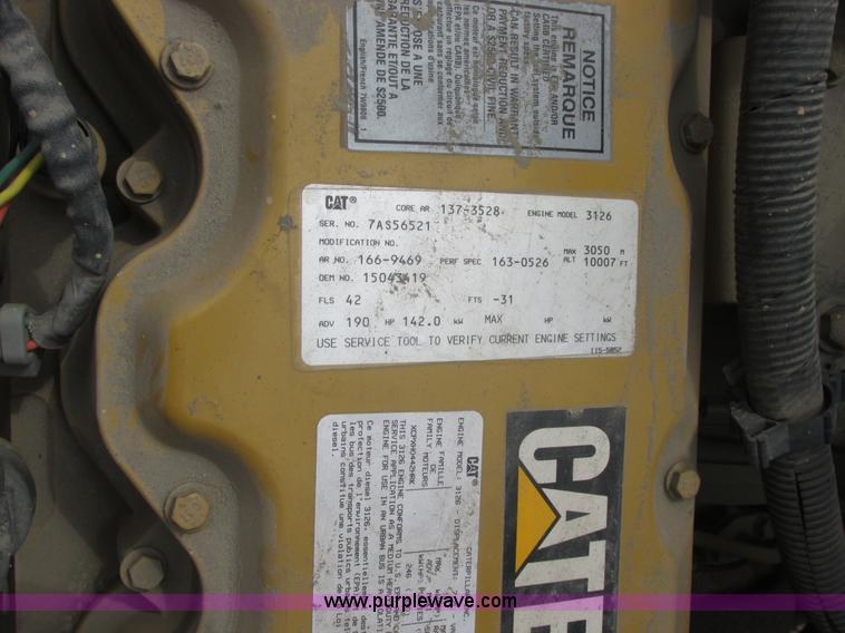 image for item A8848 1999 GMC C7500 flatbed truck with crane