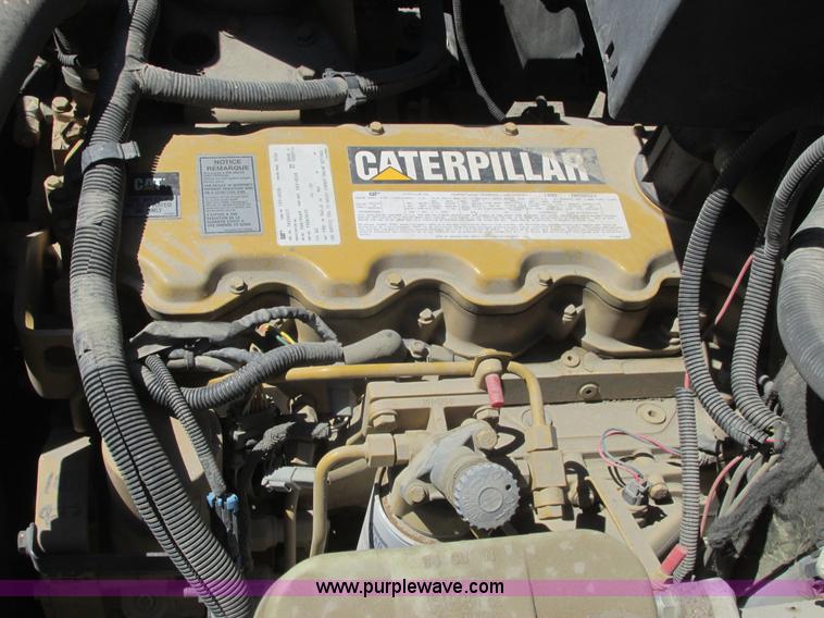 image for item A8848 1999 GMC C7500 flatbed truck with crane