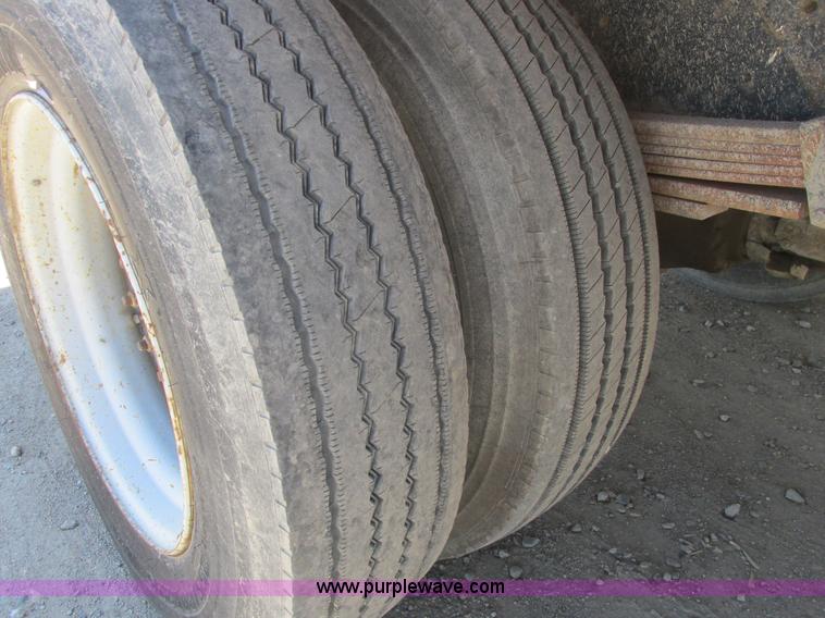 image for item A8848 1999 GMC C7500 flatbed truck with crane