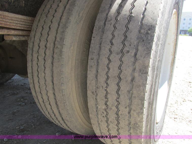 image for item A8848 1999 GMC C7500 flatbed truck with crane