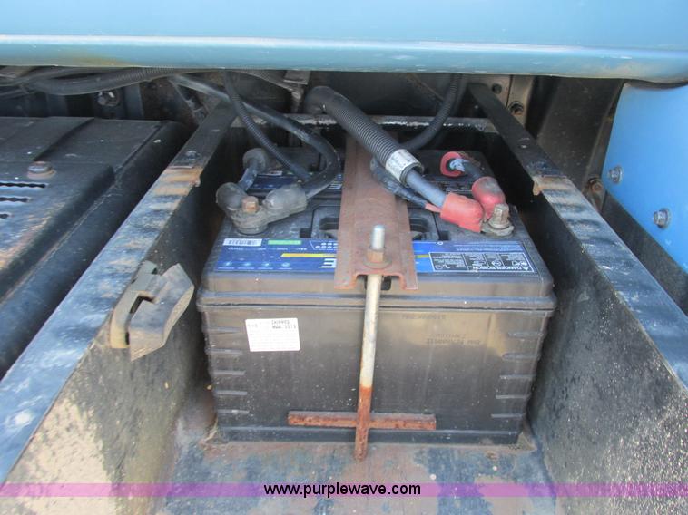 image for item A8848 1999 GMC C7500 flatbed truck with crane