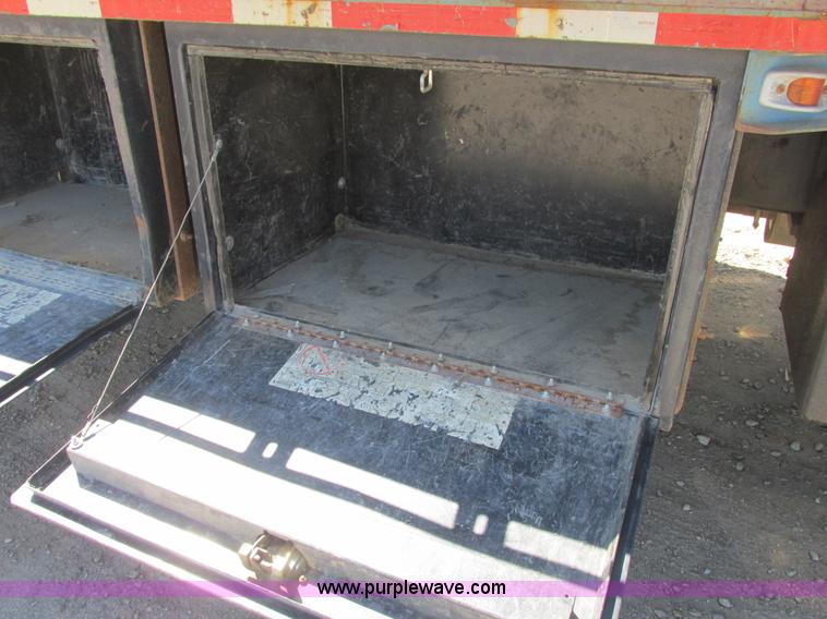 image for item A8848 1999 GMC C7500 flatbed truck with crane