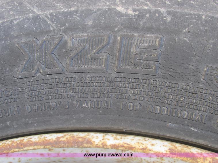 image for item A8848 1999 GMC C7500 flatbed truck with crane