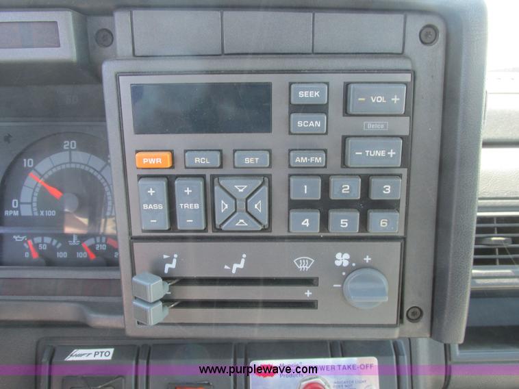 image for item A8848 1999 GMC C7500 flatbed truck with crane