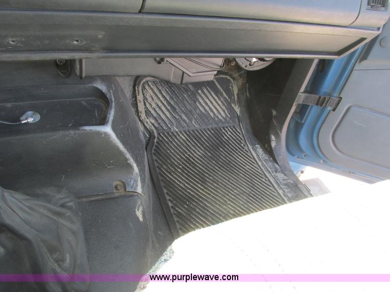 image for item A8848 1999 GMC C7500 flatbed truck with crane