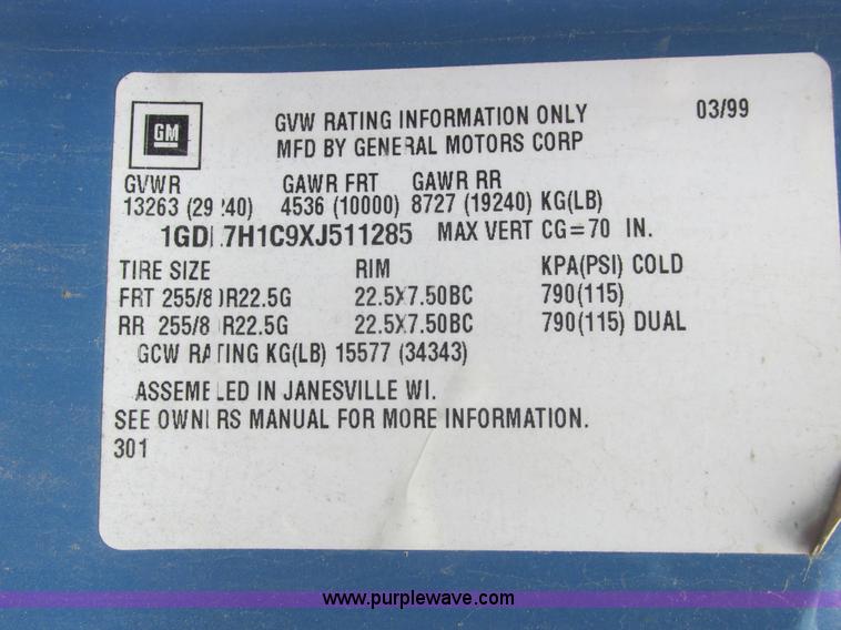 image for item A8848 1999 GMC C7500 flatbed truck with crane