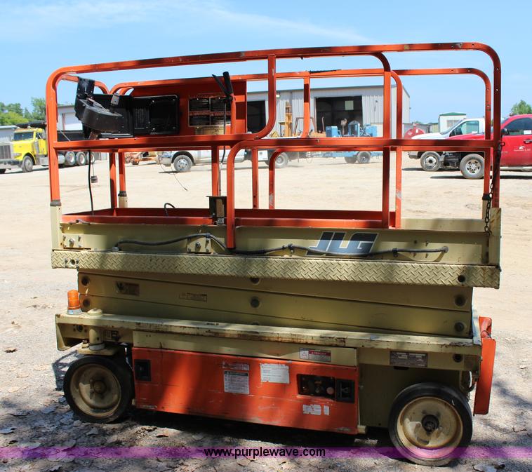 image for item I1522 1997 JLG 2033-5 electric scissor lift