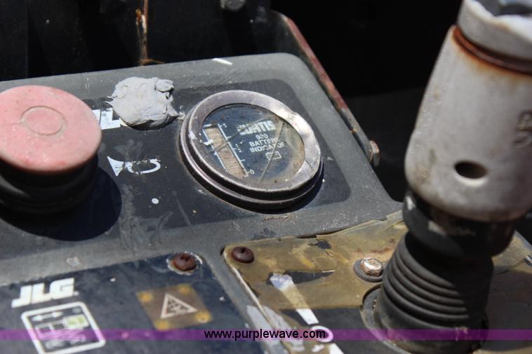 image for item I1522 1997 JLG 2033-5 electric scissor lift