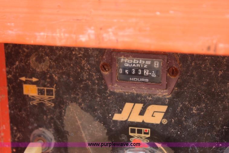 image for item I1522 1997 JLG 2033-5 electric scissor lift