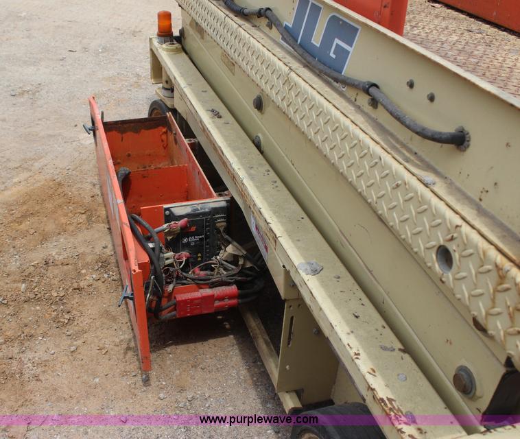 image for item I1522 1997 JLG 2033-5 electric scissor lift