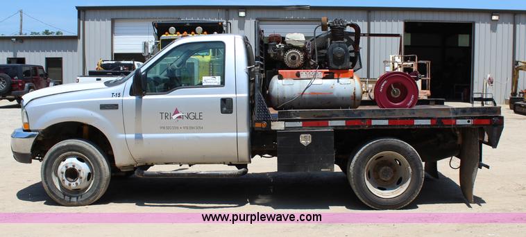 image for item I1527 1999 Ford F550 Super Duty flatbed truck