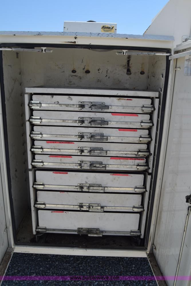 image for item I2046 2005 Sterling Acterra service truck with crane