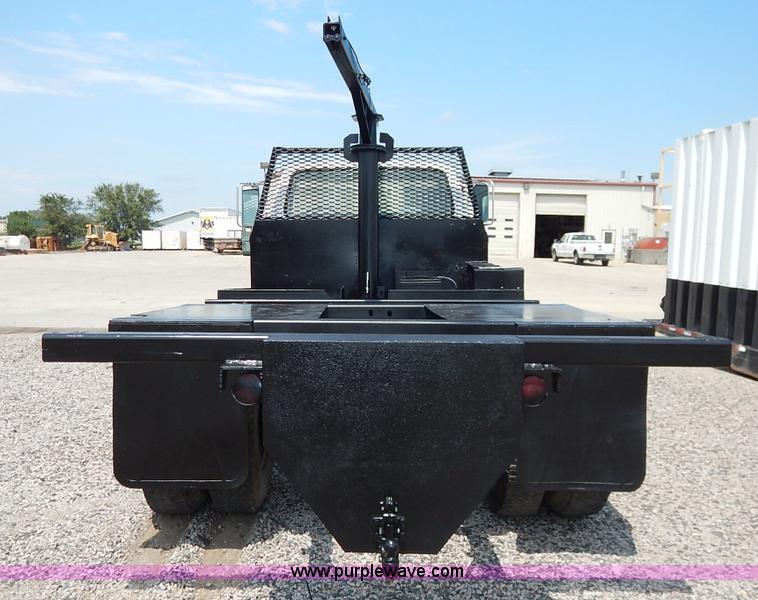 image for item K1556 1985 Ford F700 winch truck