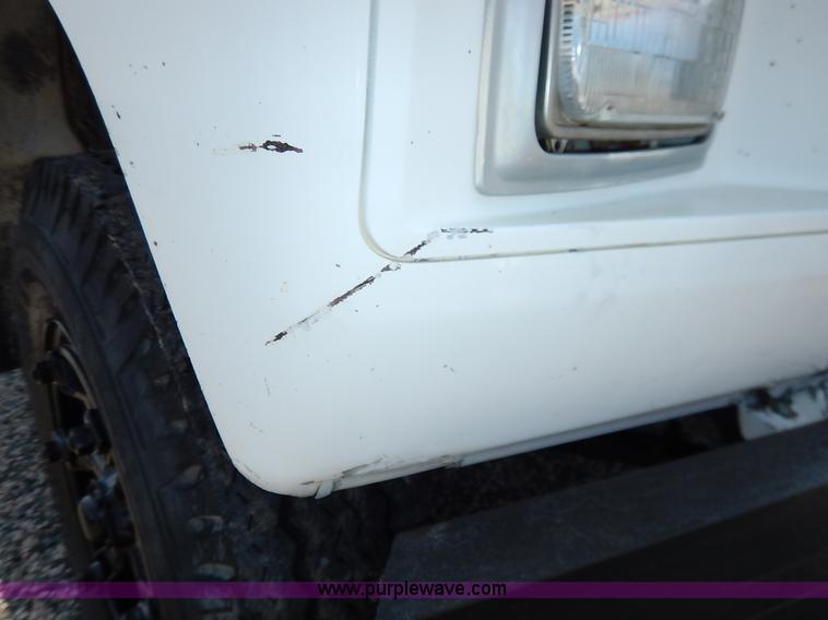 image for item K1556 1985 Ford F700 winch truck