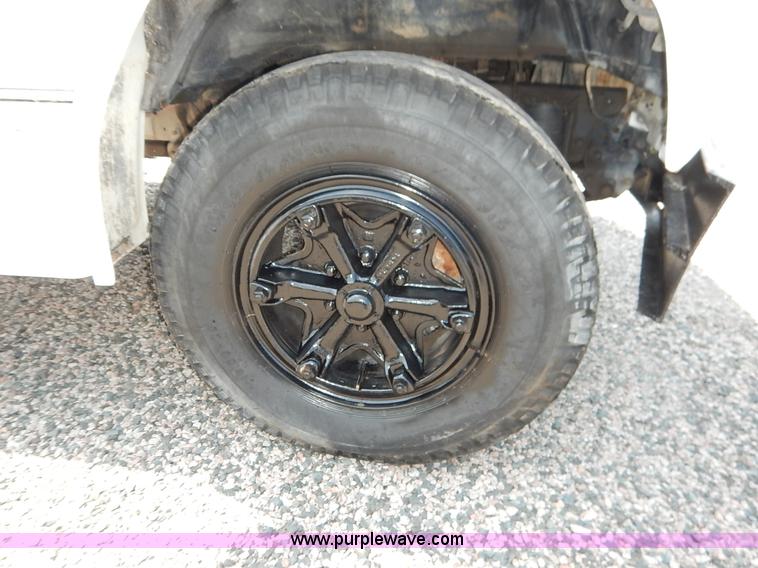 image for item K1556 1985 Ford F700 winch truck