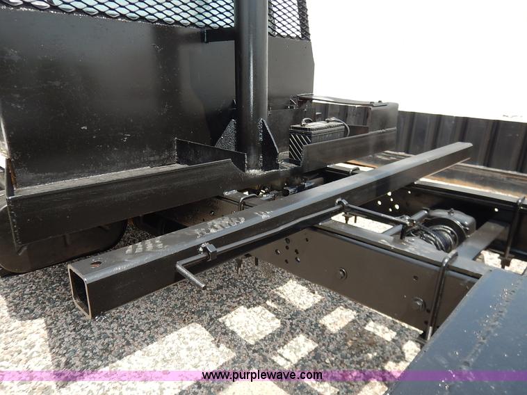 image for item K1556 1985 Ford F700 winch truck