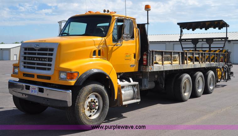 image for item F2498 2003 Sterling LT9500 flatbed truck