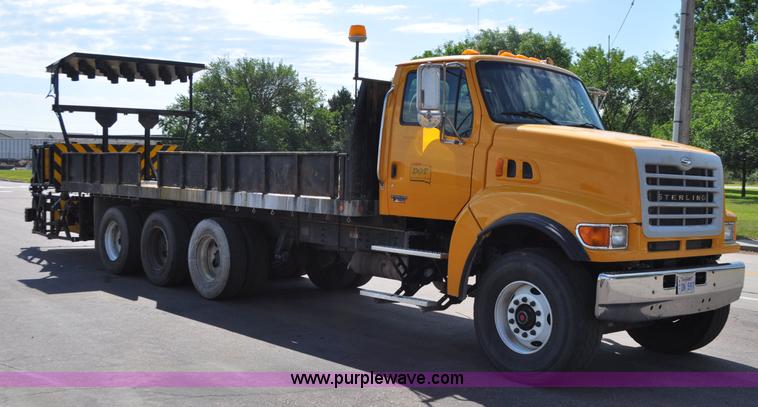 image for item F2498 2003 Sterling LT9500 flatbed truck