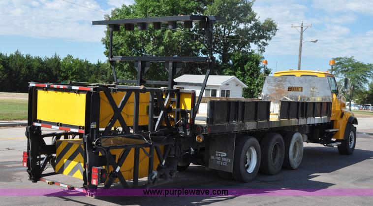 image for item F2498 2003 Sterling LT9500 flatbed truck