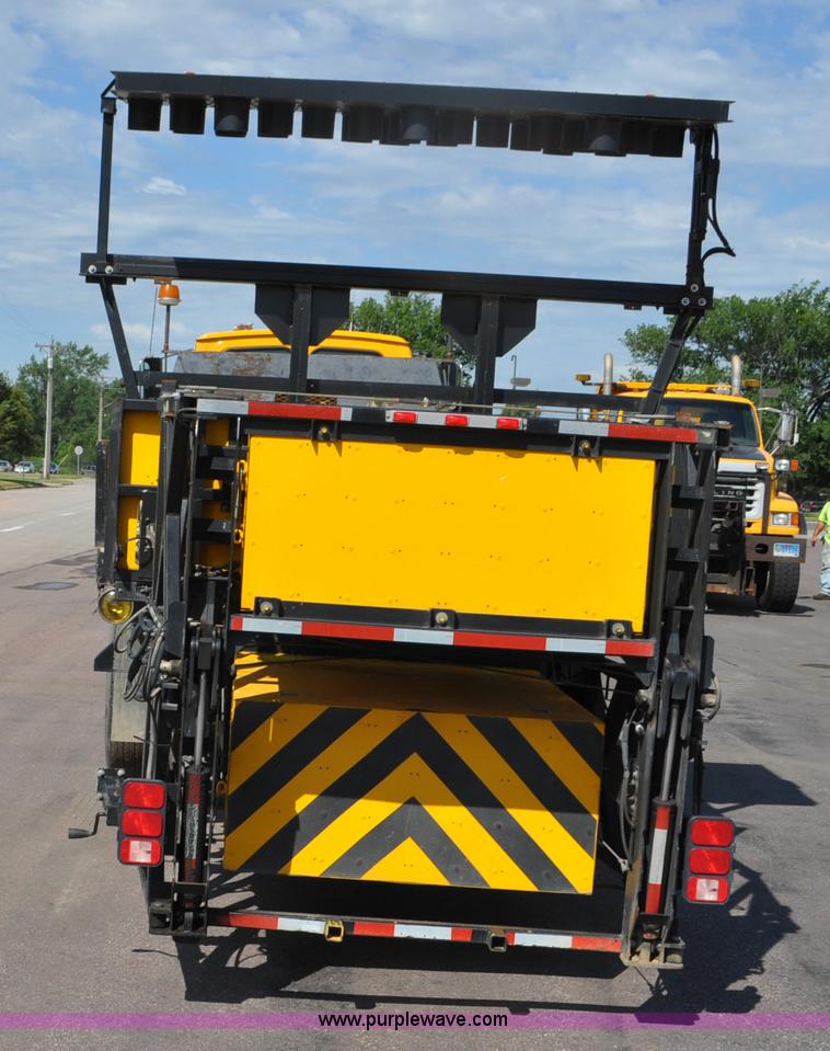 image for item F2498 2003 Sterling LT9500 flatbed truck