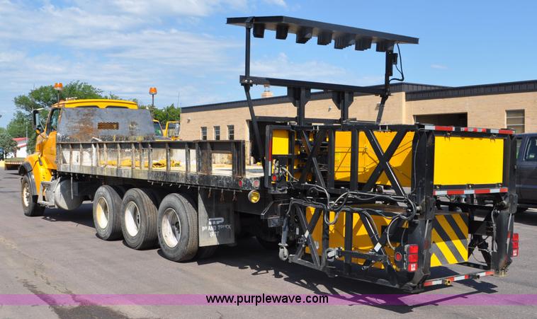 image for item F2498 2003 Sterling LT9500 flatbed truck