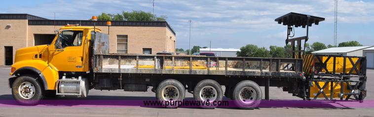 image for item F2498 2003 Sterling LT9500 flatbed truck