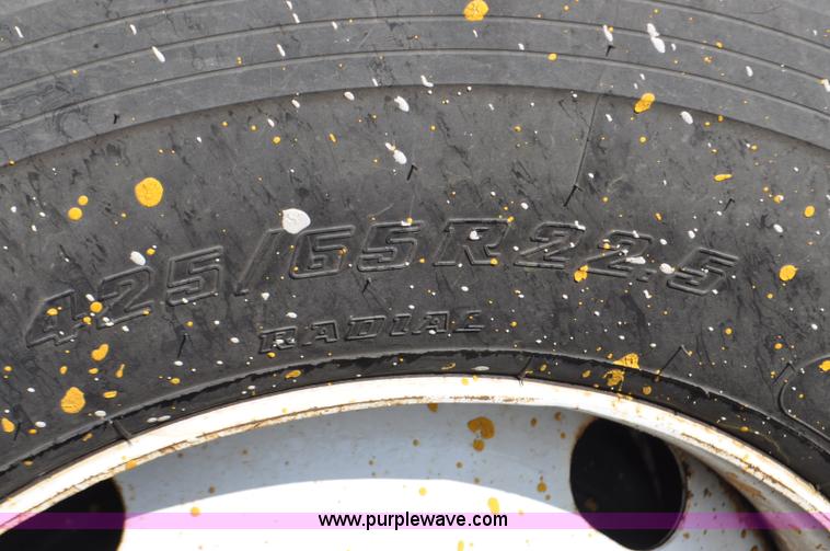 image for item F2498 2003 Sterling LT9500 flatbed truck