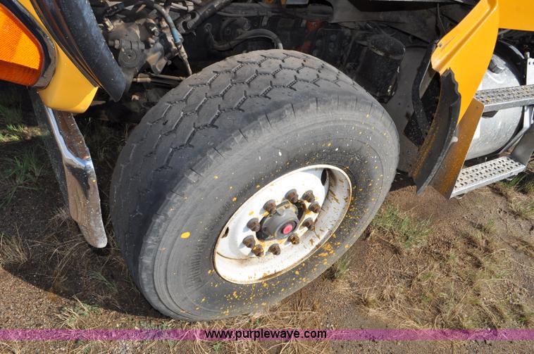 image for item F2498 2003 Sterling LT9500 flatbed truck