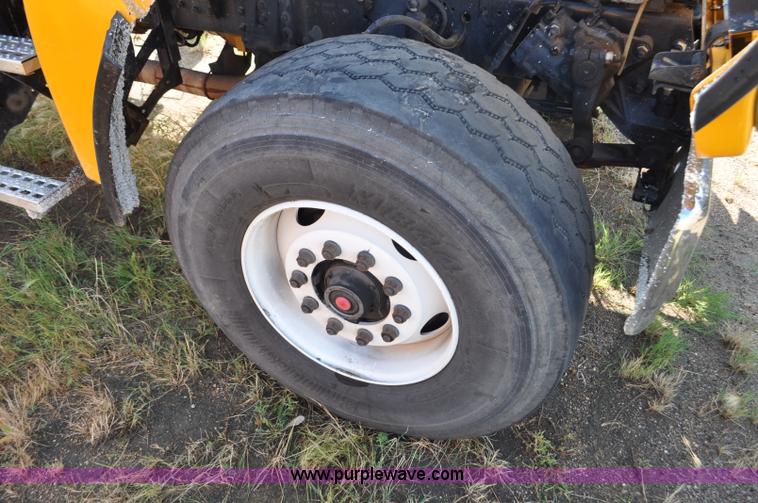 image for item F2498 2003 Sterling LT9500 flatbed truck