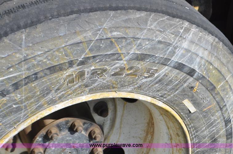 image for item F2498 2003 Sterling LT9500 flatbed truck