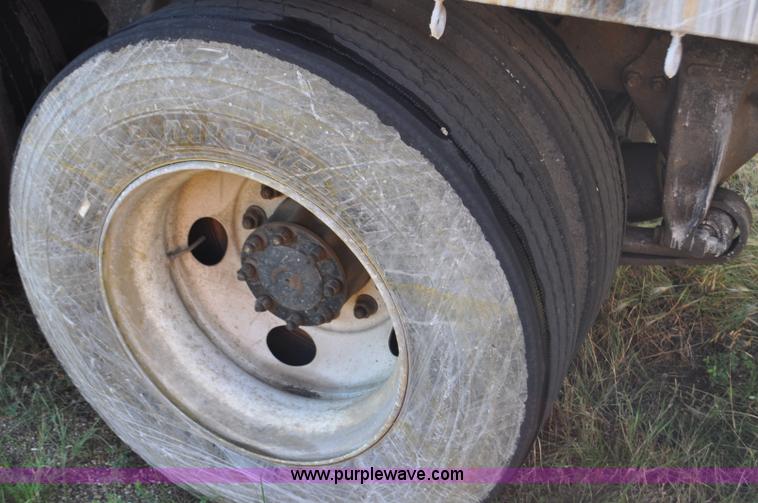 image for item F2498 2003 Sterling LT9500 flatbed truck