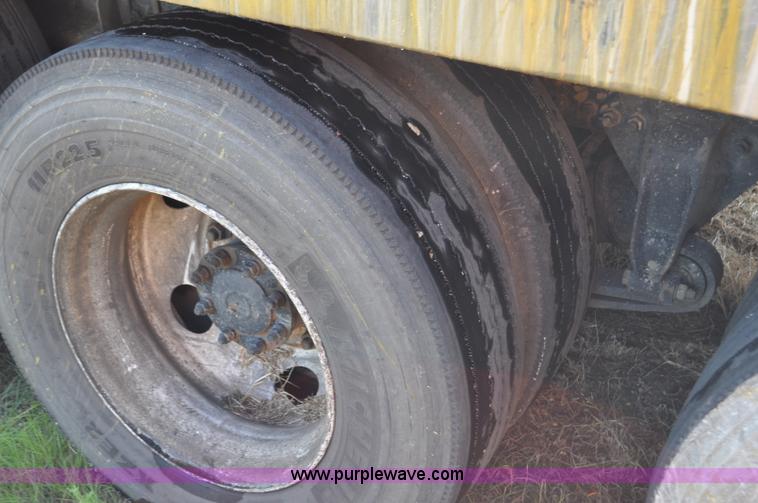 image for item F2498 2003 Sterling LT9500 flatbed truck