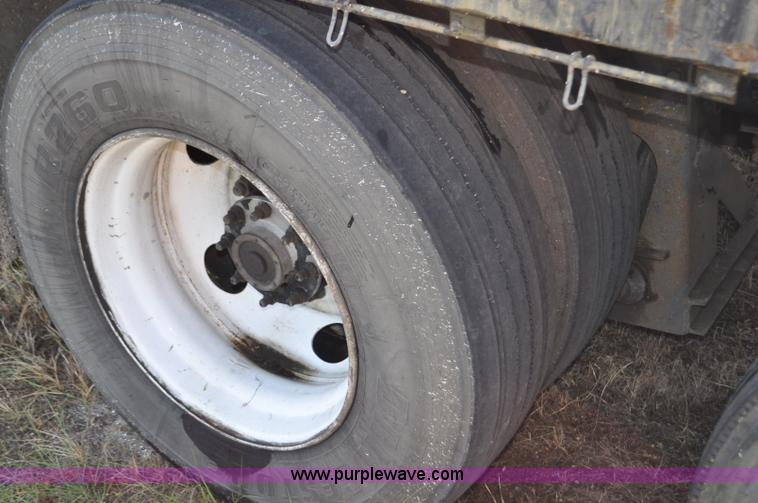 image for item F2498 2003 Sterling LT9500 flatbed truck