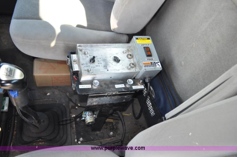 image for item F2498 2003 Sterling LT9500 flatbed truck