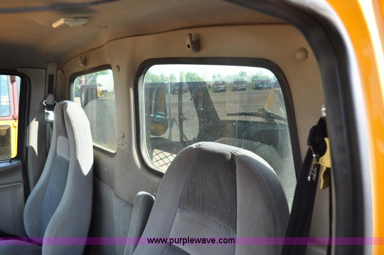 image for item F2498 2003 Sterling LT9500 flatbed truck