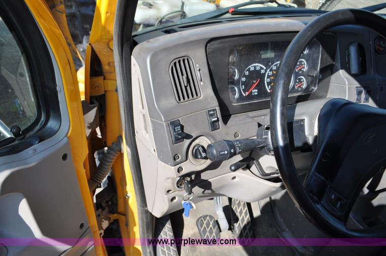 image for item F2498 2003 Sterling LT9500 flatbed truck