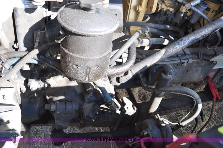 image for item F2498 2003 Sterling LT9500 flatbed truck