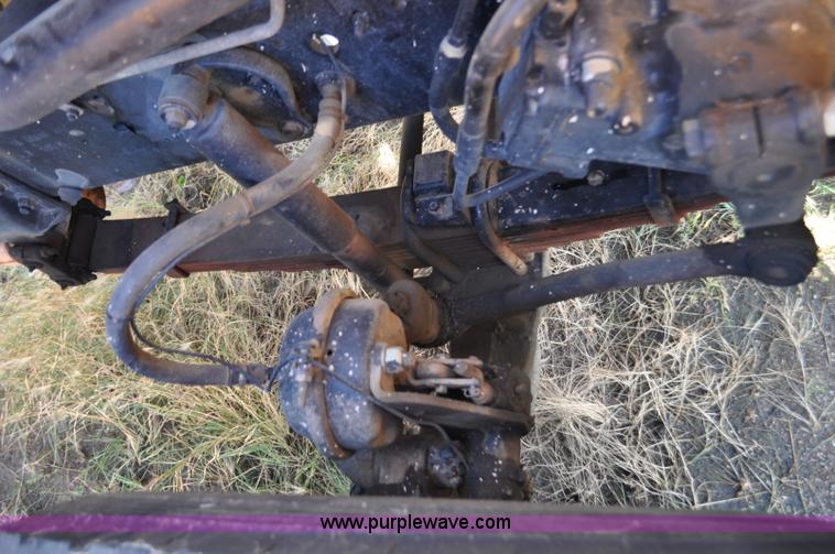 image for item F2498 2003 Sterling LT9500 flatbed truck