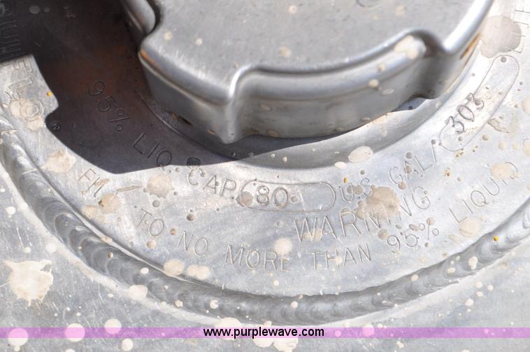 image for item F2498 2003 Sterling LT9500 flatbed truck