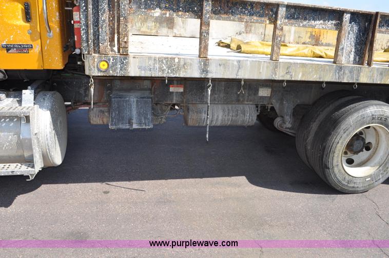 image for item F2498 2003 Sterling LT9500 flatbed truck