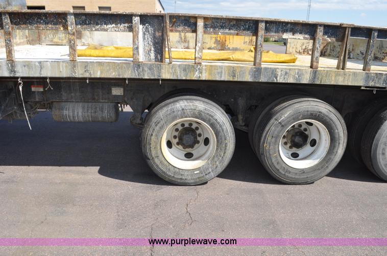 image for item F2498 2003 Sterling LT9500 flatbed truck