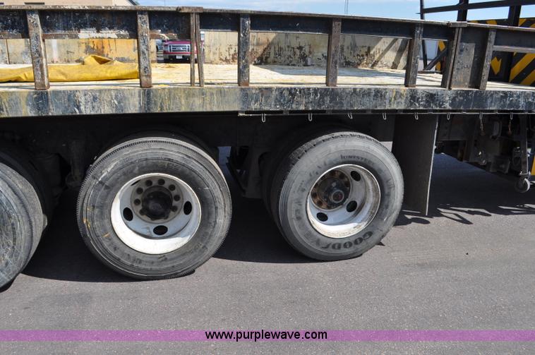 image for item F2498 2003 Sterling LT9500 flatbed truck