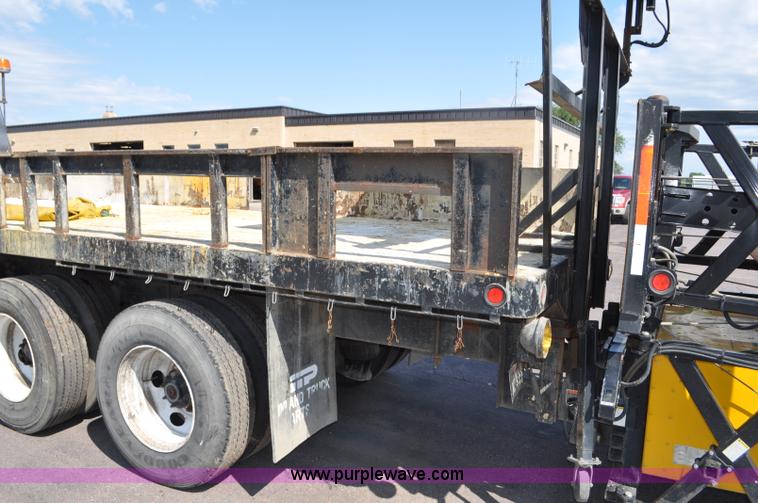 image for item F2498 2003 Sterling LT9500 flatbed truck